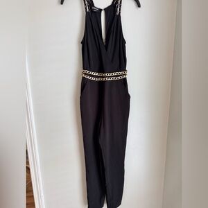 bebe Black Jumpsuit with Gold Chain Detail